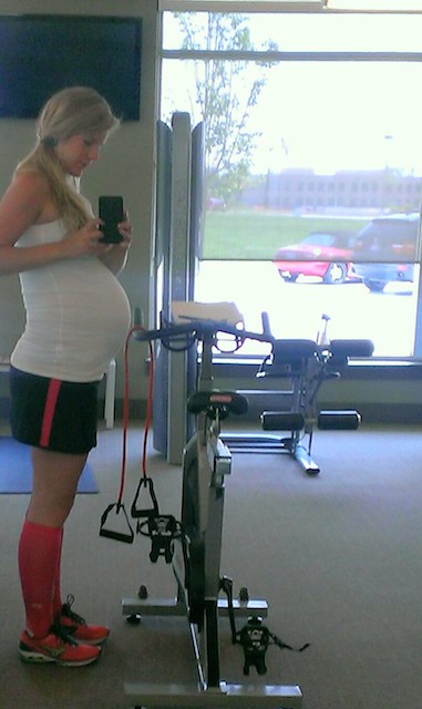 Belly Selfie in they gym with my cool compression socks!